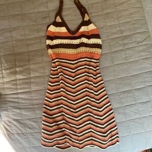 Beach dress in brown pink and beige with a tint of white. Halter top.
